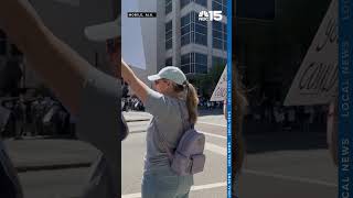 Hundreds protest Trump administration in latest "No Kings" event in Downtown Mobile - NBC 15