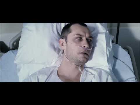 Repo Men (2010) official trailer still — Jude Law and Forest Whitaker in a neon-lit future