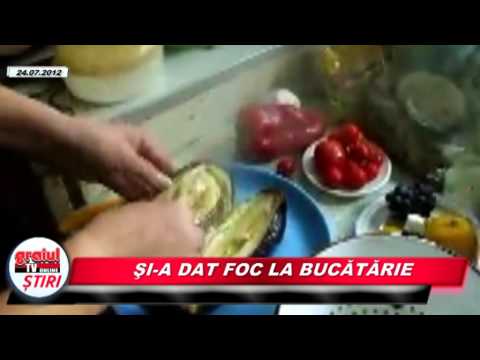 SI-A DAT FOC LA BUCATARIE