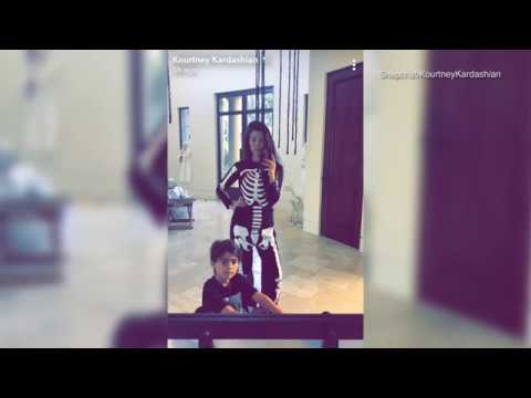 Kourtney Kardashian & Penelope dress in matching skeleton pyjamas