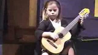 5 year old Kate playing Lightly Row on guitar