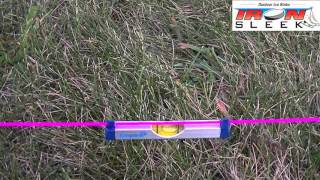 Measuring Grade for a Backyard Rink with a line level.