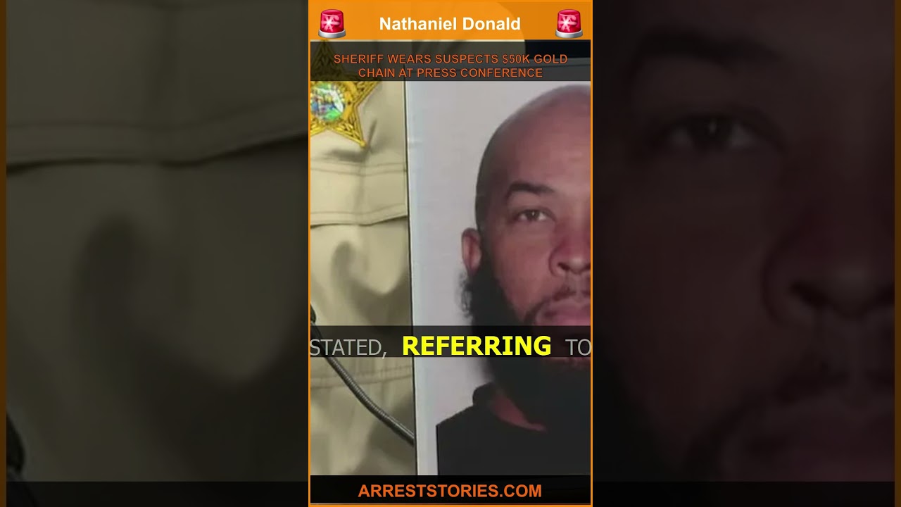 SHERIFF WEARS SUSPECTS $50K GOLD CHAIN AT PRESS CONFERENCE