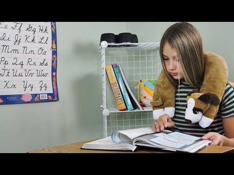 Slide 7 - Puppy Vibrating Sensory Neck Pillow (video)