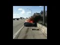 1971 impala on fire on side of the highway