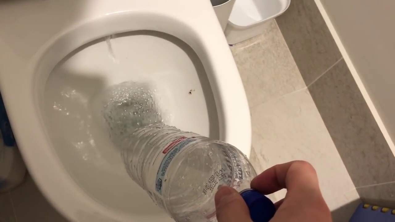 Unclog toilet with a plastic bottle (with no plunger)