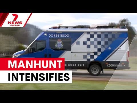 Police intensify manhunt after officers murdered | 7NEWS