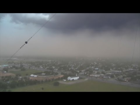 The National Weather Service says a "wall of dirt" passed over Lubbock, Texas on Wednesday. It says strong thunderstorms picked up a large amount of dust, which moved across that region of North Texas along with 60 mph wind gusts. (June 6)