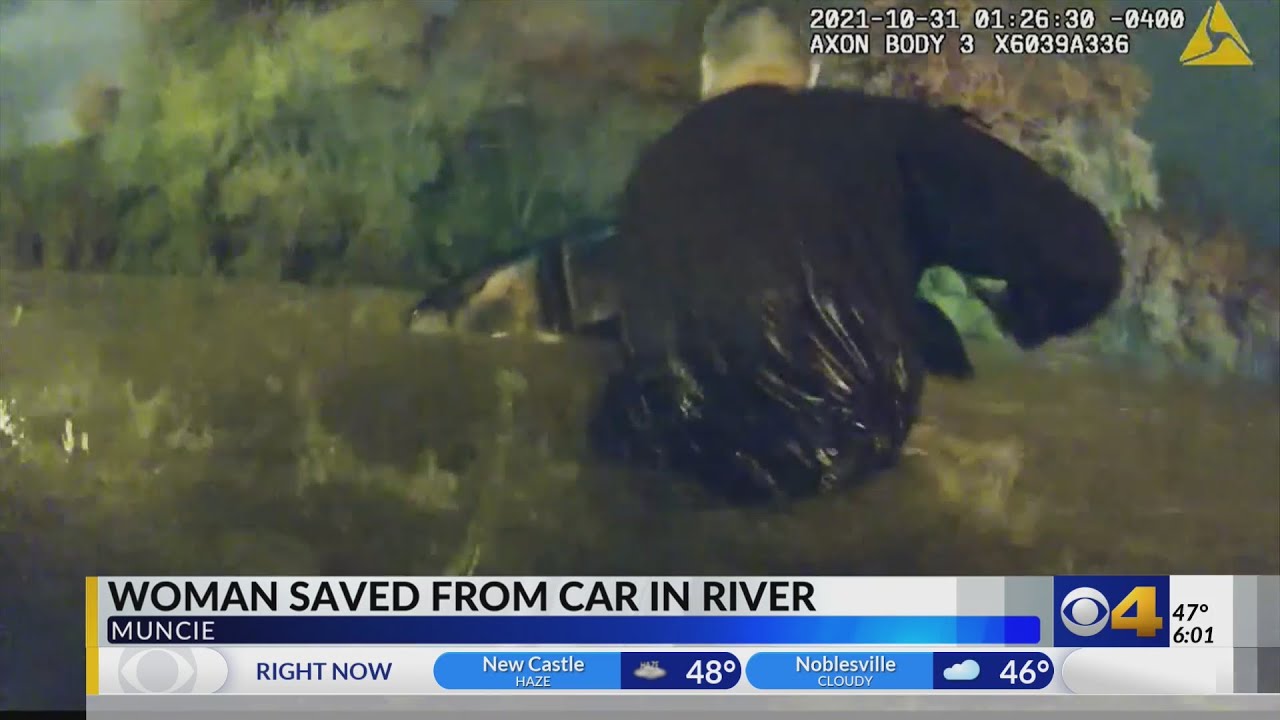 CAUGHT ON CAMERA: Officers jump into river, rescue woman from sinking car in Muncie