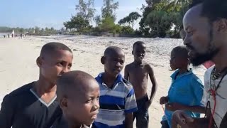 Why some Africans think white people are smarter.  At Tanzania MjiMwema beach