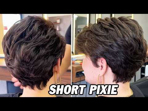Short pixie haircut showcasing textured layers and volume at the crown, emphasizing modern style and versatility for curly hair.