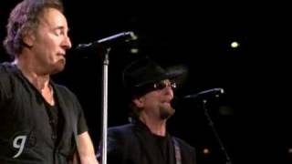 The Boss and the Byrd-McGuinn onstage with Springsteen