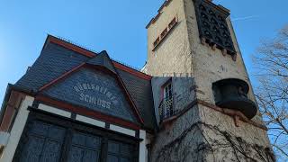Breuer&#39;s Rüdesheim Castle Hotel and Bell Tower in Germany