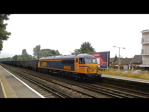 GBRf's 69003 (with tones) on the Mountfield Sidings to Southampton, at West Byfleet on 21/07/22