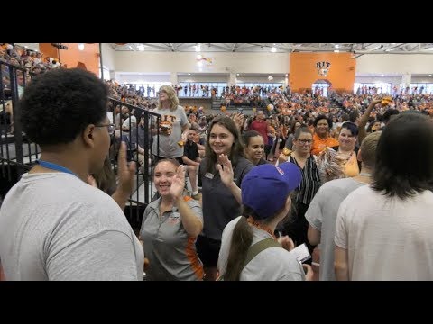 A frame from the embedded video, with a play button over the image.