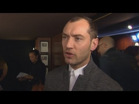 Jude Law describes acting as a "silly job" at Dom Hemingway premiere
