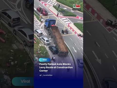 Poorly Parked Axia Blocks Lorry Route at Construction Corner