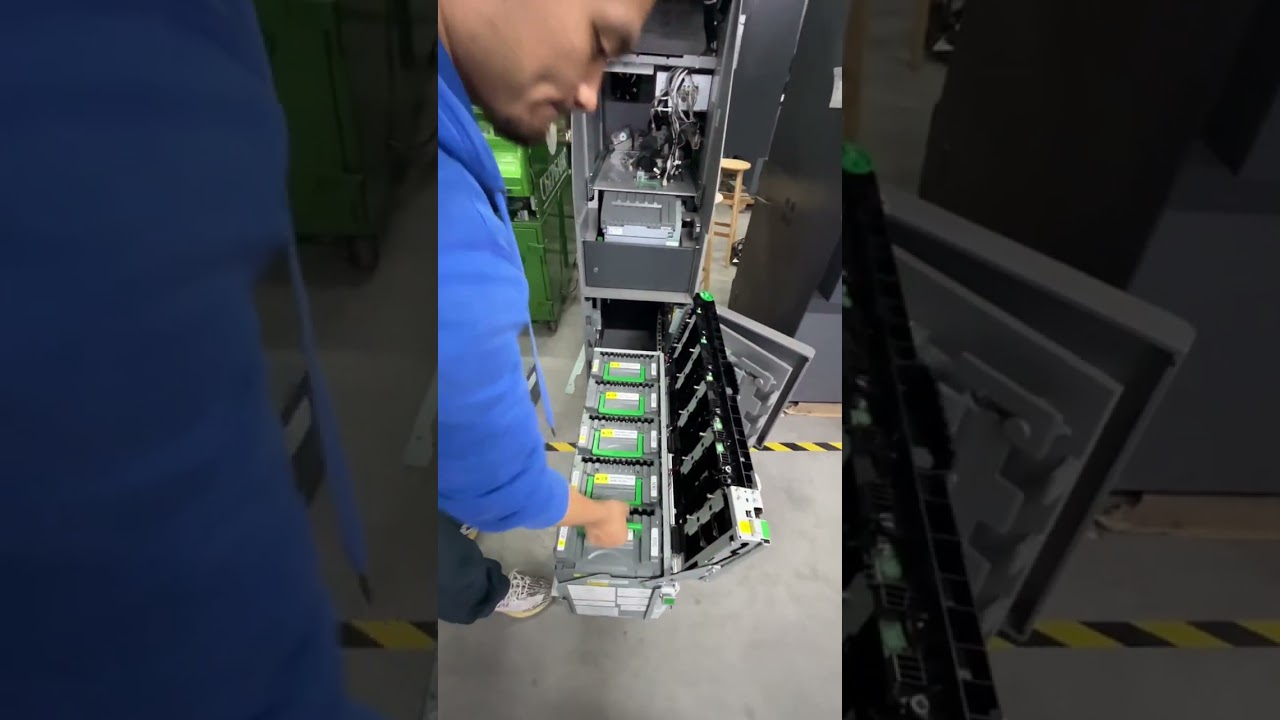 How does it work? This guy opens the ATM safe and takes the money.