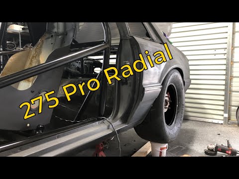 How To Fit A 275 Pro Radial In Stock Fox Body Wheel Tubs! (Hint-Beat The H#!! Out Of It) :-)