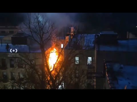1 person in custody after Bronx fire injures 2 firefighters