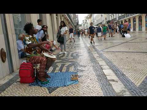 African drum show from an African guy on streets of Lisbon