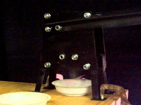 The "CrazyCrusher", Hand Operated Rock Crusher crushing glass for smelting