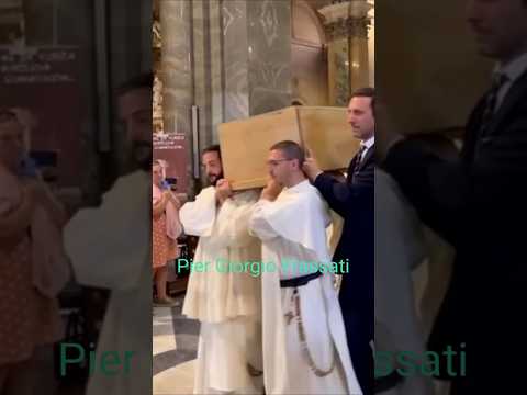 The transfer of the incorrupt body of Pier Giorgio Frassati to St. John's Cathedral in Turin