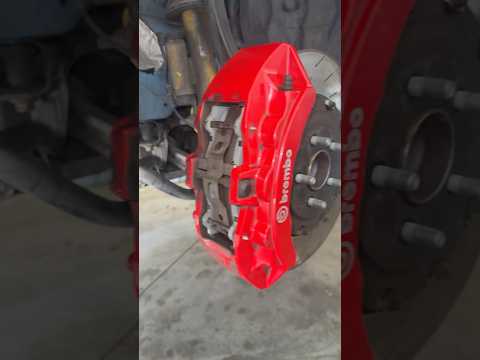 Replacing brakes on a Hellcat in less then 1 minute  #hellcat #dodge #brembo #learning #fyp #boom