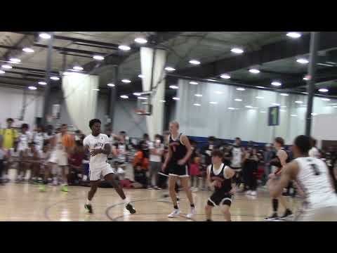 Lance Gill gets the big dunk for Team United 17s