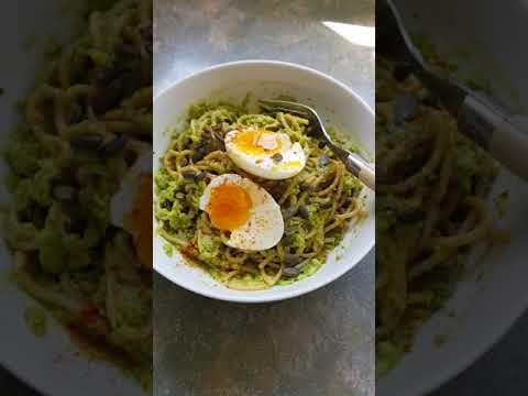 Easy lunch smashed avocado and spaghetti - finishing touches