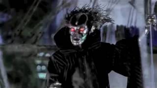 the masked figure arrives