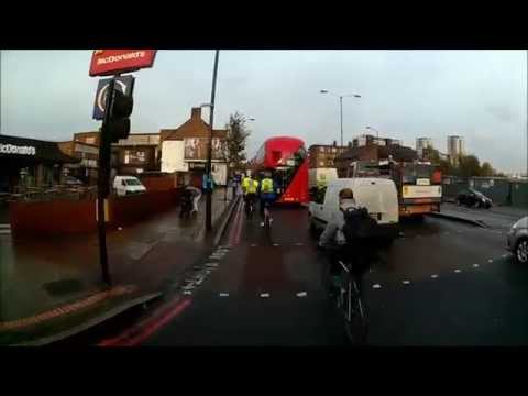 2014.11.13 Silly Cyclist Undertakes Moving Bus