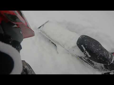 Deep delicious North West Montana Powder. Snowmobiling RMK 800 Pro Polaris. Epic Powder shots