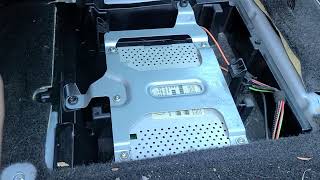 How to Remove Satellite Tuner Module from 2007 Mini Cooper for Repair.