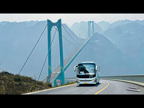 The world's highest bridge: a 4K drive tour of the Huajiang Canyon Bridge in China.