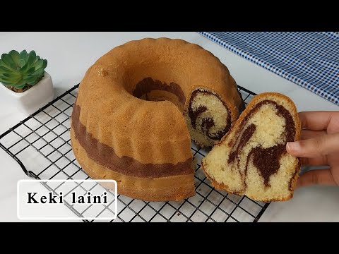 Jinsi ya kutengeneza keki ya kuchambuka na laini sana | Marble cake recipe