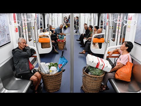 Chongqing says 'yes' to farmers carrying bamboo baskets on the subway