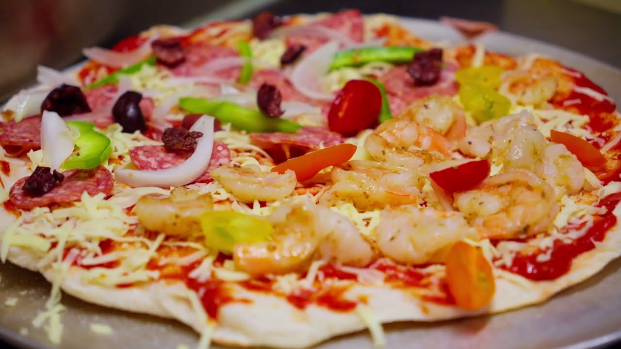Marcos Cafe & Bistro — wood-fired pizza making