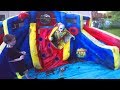 Scary Clown Attacks Through Inflatable Water Slide!