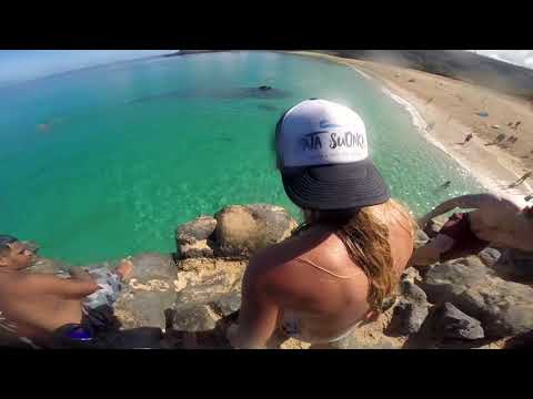 Surf Camp Hawaii guest Jump at Waimea Bay | Pata Sudaka