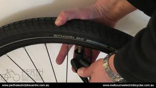 How to pump up a bike tyre with a Schrader valve