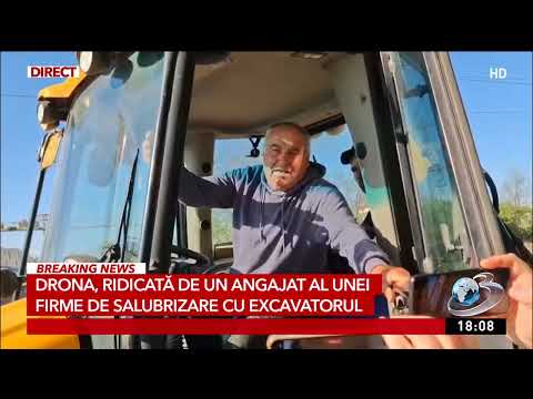 Drona, ridicată de un angajat al unei firme de salubrizare cu excavatorul