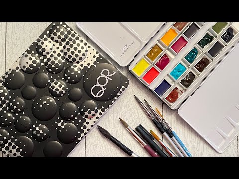 My new palette and a Qor 24 color watercolor set.