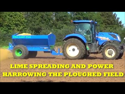 LIME SPREADING AND POWER HARROWING THE PLOUGHED FIELD