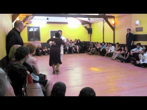 María del Carmen Romero  and  Jorge Dispari  are  dancing  to  the  milonga  "  Cacareando  "