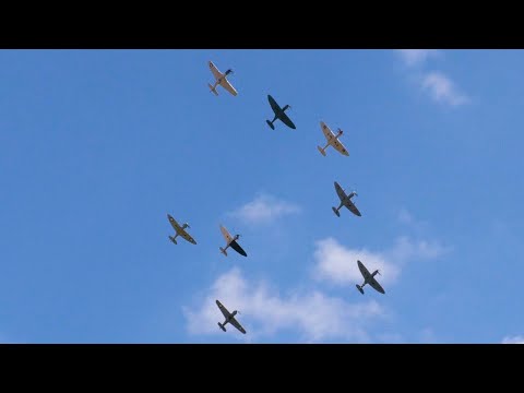 8 WWII fighters tailchasing over Duxford: Mustang, Hurricanes and Spitfires