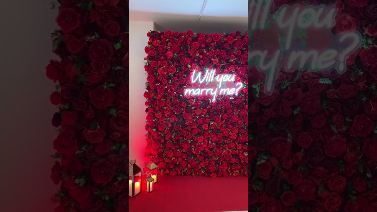 Proposal Decorations - Flower Wall, Candles, and Neon Sign