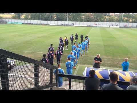Players walking out for Dulwich Hamlet v East Thurrock United at Tooting & Mitcham's Imperial Fields