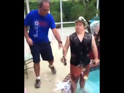 funny guy breaks beer at the swimming pool
