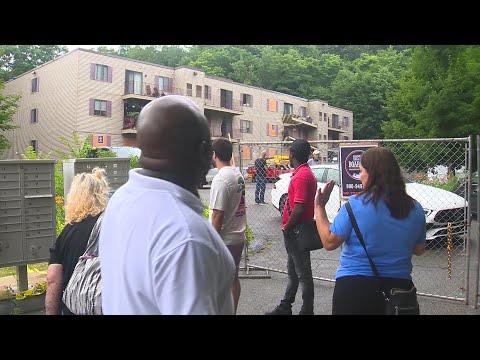 Tempers flare as apartment building that had roof collapse is condemned